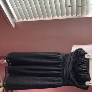 A black sparkly strapless dress